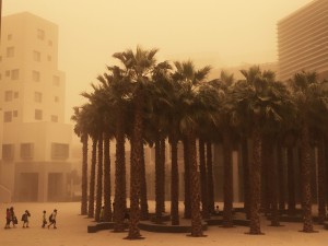 Emirati children visiting the NYU campus in Abu Dhabi navigate a major sandstorm 3 April 2015.