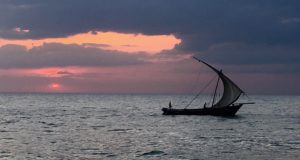 A dhow crosses Zanzibar bay 8 July 2016.